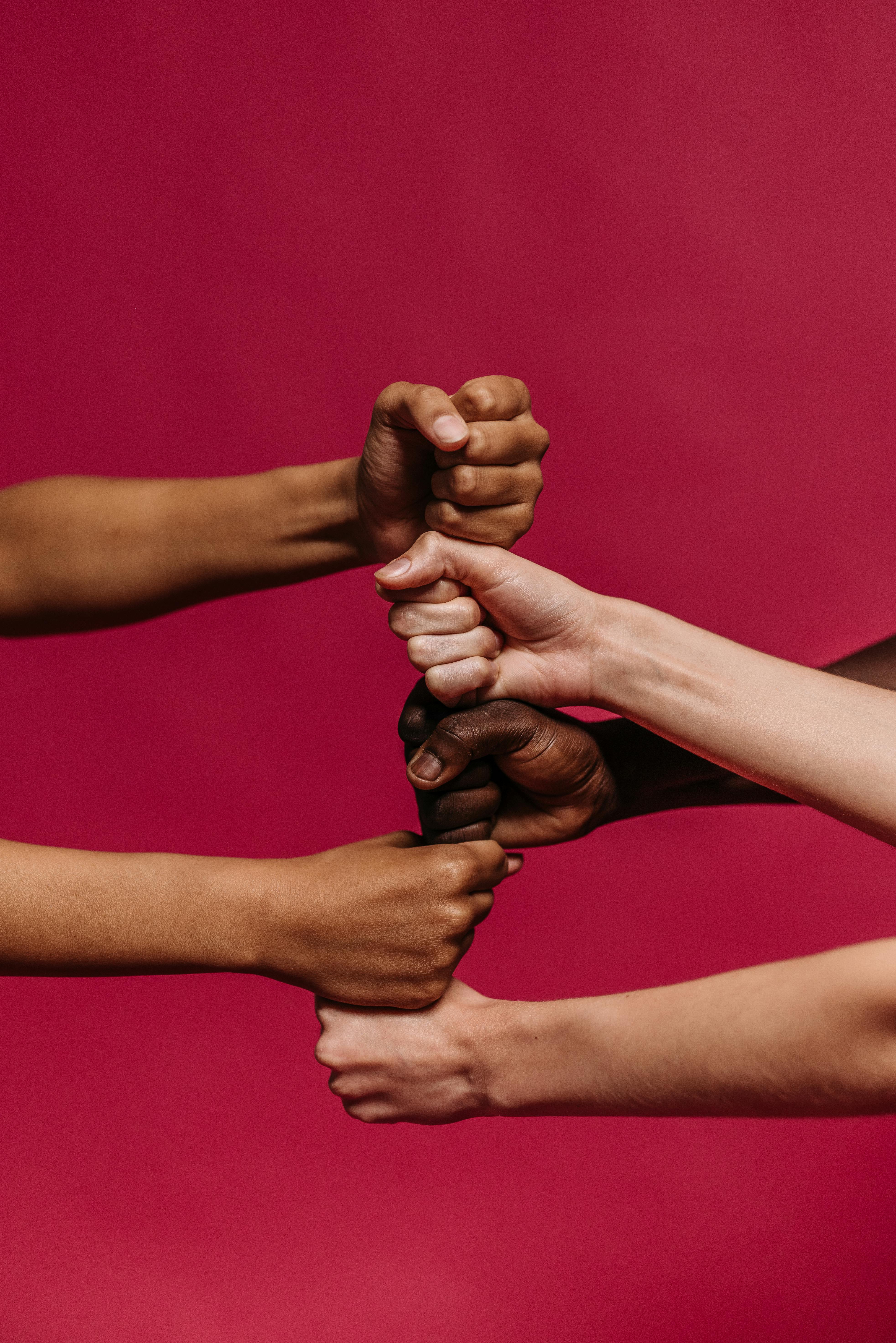 Diverse hands united in collaboration